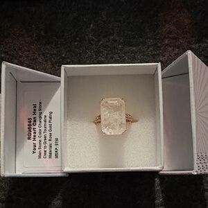 Elegant Gold Ring with Clear Stone